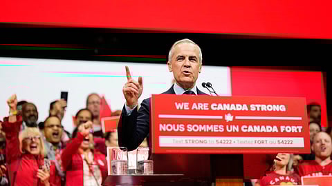 Canadian Prime Minister Mark Carney speaks on stage at his campaign headquarters after the Liberal Party won the Canadian election in Ottawa on Tuesday, April 29, 2025.