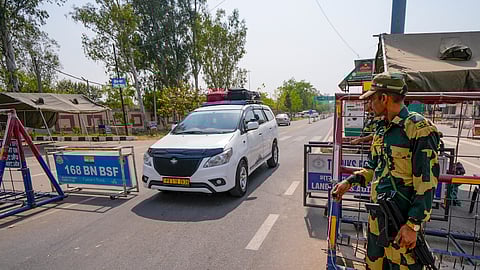 A BSF personnel stands guard as Pakistani nationals holding NORI (No Obligation to Return to India) visas cross into India via the Attari-Wagah ICP near Amritsar on April 29, 2025, amid rising Indo-Pak tensions following the Pahalgam terror attack.(Representative Image)