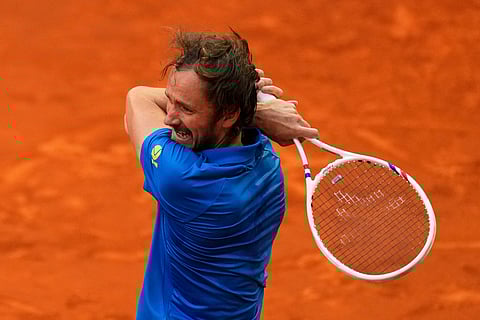 Russia's Daniil Medvedev returns the ball against United States' Brandon Nakashima during the Madrid Open tennis tournament in Madrid, Spain, Tuesday, April 29, 2025.