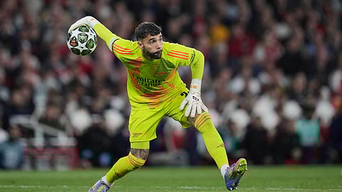 Arsenal's goalkeeper David Raya throws the ball during the Champions League semifinal first leg soccer match between Arsenal and Paris Saint-Germain on Tuesday, April 29, 2025.