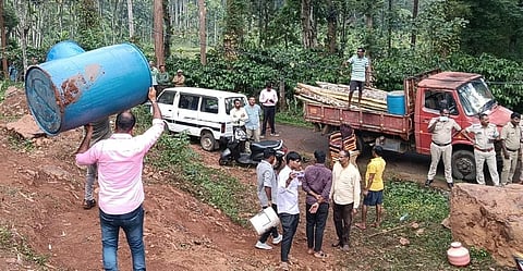 Tribal families who had occupied government land near Ammathi in South Kodagu as a form of protest were evicted by revenue department officials on Monday evening.