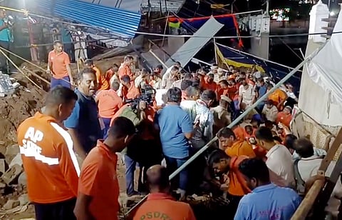 Rescue operation underway after a rain-soaked wall collapsed at the Sri Varaha Lakshmi Narasimha Swamy Temple, at Simhachalam in Visakhapatnam, Wednesday, April 30, 2025.