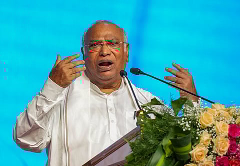 Congress President and Leader of Opposition in Rajya Sabha Mallikarjun Kharge addresses an event to regularise the service of 'Pourakarmikas', civic workers, under the Bruhat Bengaluru Mahanagara Palike (BBMP), in Bengaluru, Karnataka, Thursday, May 1, 2025.