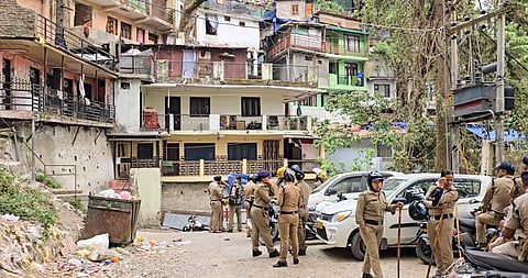 Police keep vigil after two groups clashed Wednesday night after the family of a minor lodged a rape complaint against a 65-year-old man, in Nainital,