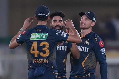 Gujarat Titans' Mohammed Siraj, center, celebrate the dismissal of Sunrisers Hyderabad's Aniket Verma during the Indian Premier League cricket match between Gujarat Titans and Sunrisers Hyderabad at Narendra Modi Stadium in Ahmedabad, India, Friday, May 2, 2025.