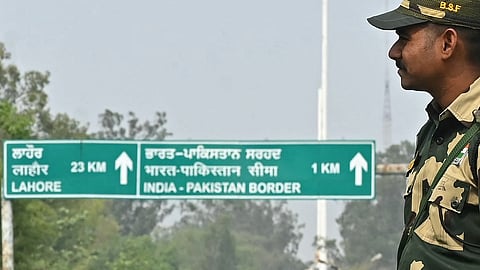 A Border Security Force (BSF) soldier stands guard near the India-Pakistan Wagah border post, about 35 km from Amritsar, on May 1, 2025.