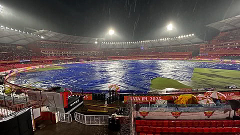 Ground is covered as its rain during the Indian Premier League cricket match between Sunrisers Hyderabad and Delhi Capitals at Rajiv Gandhi International Cricket Stadium in Hyderabad, India, Monday, May 5, 2025.