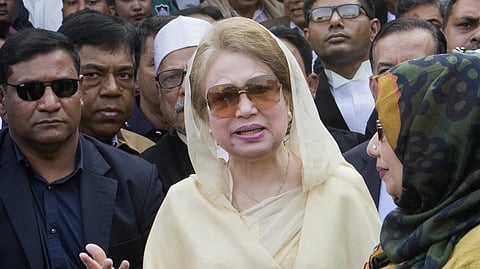 Bangladesh’s former prime minister and Bangladesh Nationalist Party (BNP) chairperson Khaleda Zia, center, leaves after a court appearance in Dhaka, Bangladesh, Dec. 28, 2017.