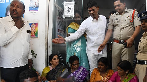 Family members of the pregnant woman protest in Ibrahimpatnam mandal on Monday.