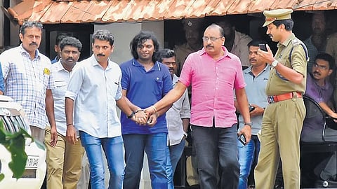 Cadell Jeansen Raja, wearing a blue shirt