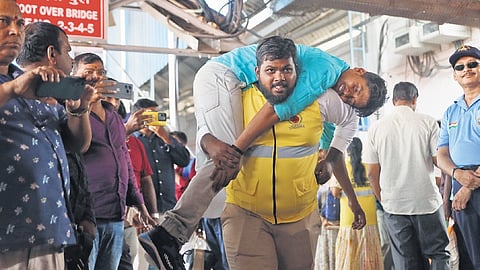 A man carries a volunteer posing as an injured victim during the nationwide civil defence mock drill at Kacheguda Railway Station. Image used for representational purpose only.