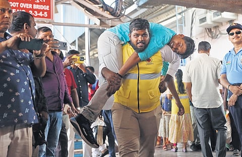 A man carries a volunteer posing as an injured victim during the nationwide civil defence mock drill at Kacheguda Railway Station. Image used for representational purpose only.