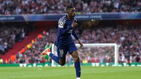 PSG's Ousmane Dembele celebrates after scoring the opening goal during the Champions League semifinal first leg soccer match between Arsenal and Paris Saint-Germain at Emirates Stadium in London, England, Tuesday, April 29, 2025.