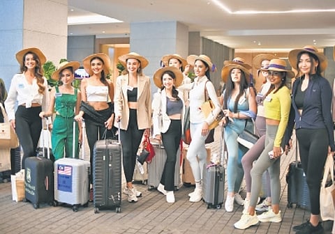 Miss World contestants pose for a group photo at the Trident Hotel in Hyderabad on Friday