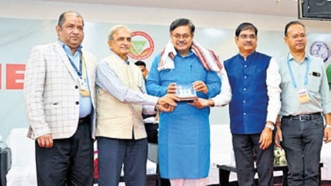 Law minister Prithiviraj Harichandan being felicitated at the conference.