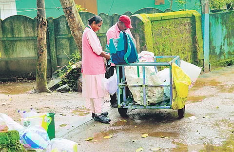 Haritha Karma Sena volunteers collecting waste from households