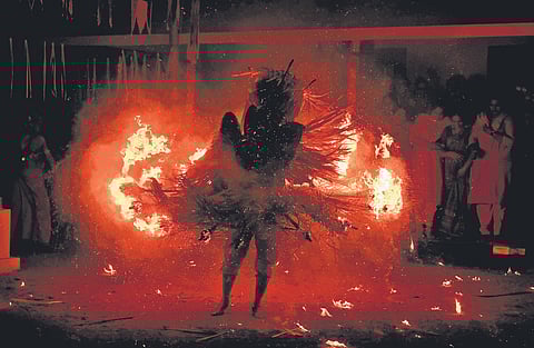 Thee Kuttichathan thira performance