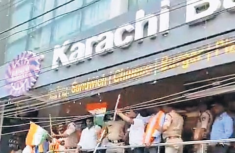 Protesters at the RGIA branch of Karachi Bakery on Sunday