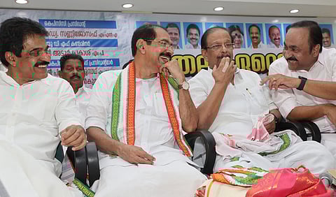 Leader of Opposition VD Satheesan sharing a light moment with Sunny Joseph, who took over as the new KPCC president
