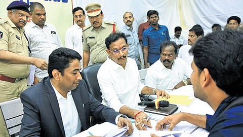 Vijayawada MP Kesineni Sivanath takes representations from public at Tiruvuru on Monday.