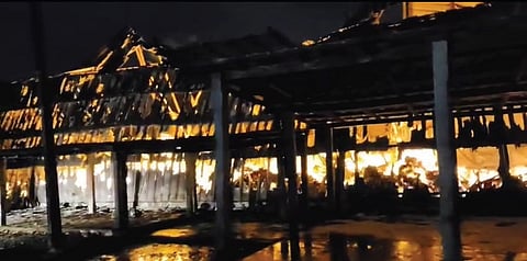 The charred building of Bevco outlet at Pulikeezhu, Tiruvalla