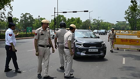 Delhi Police officials seen checking the vehicles and details of the drivers as the National Capital is on High Alert at India Gate on May 10, 2025 in New Delhi.