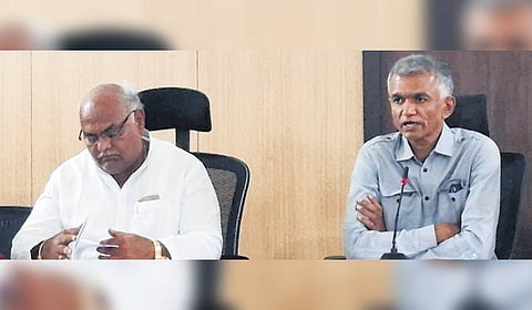 Revenue Minister Krishna Byre Gowda chairs a review meeting, as his cabinet colleague Shivanand Patil looks on, in Vijayapura on Tuesday