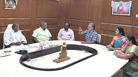 Chief Minister N Rangasamy chairing a meeting with officials on improving health care needs of citizens.