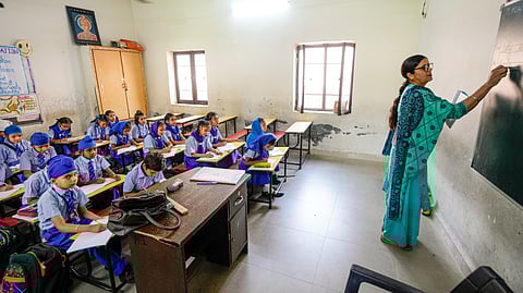 Students attend classes after schools reopened following a bilateral understanding between India and Pakistan, near Attari border, in Amritsar district, Punjab, Wednesday, May 14, 2025.