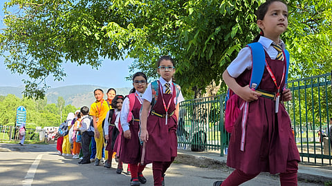 Students arrive after schools reopened following a bilateral understanding between India and Pakistan, in Baramulla, J&K, Wednesday, May 14, 2025