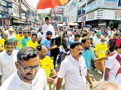 People take out the ‘pettivaravu’ procession as part of Kondotty Nercha