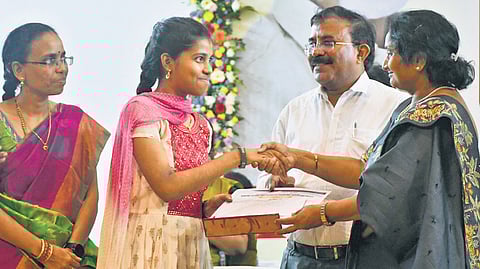 BC Welfare Minister S Savitha distributes cash prizes, mementos and certificates to SSC and Intermediate students in Vijayawada on Thursday