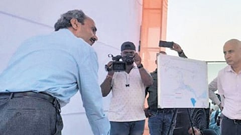 File photo of officials discussing the plan to acquire land at Badatubi in 2023