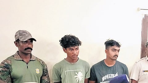 The two accused youths with police