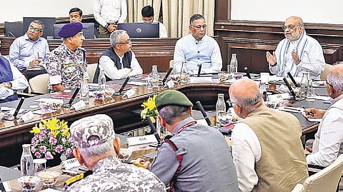 Union Home Minister Amit Shah with others during the inauguration of an upgraded multi-agency centre for intelligence sharing in New Delhi on Friday.