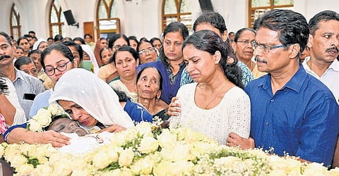 The parents and sister of Ivin Jijo are all tears as his last rites were performed
at St Augustine’s Church cemetery, Thuravoor, on Friday