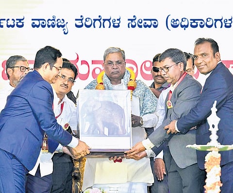 Chief Minister Siddaramaiah being felicitated at the golden jubilee programme organised by Karnataka Commercial Taxes Services (Officers) Association in Bengaluru on Saturday