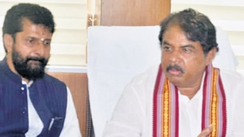 LoP in the Assembly R Ashoka addresses a press conference, as BJP MLC CT Ravi looks on, in Chikkamagaluru on Sunday