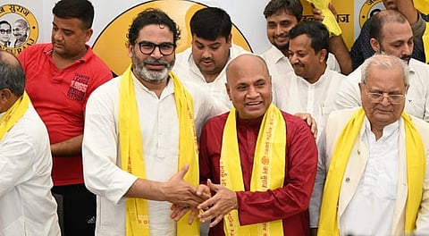 Former Union Minister RCP Singh with Jan Suraaj Party chief Prashant Kishor in Patna