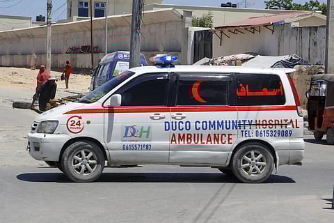 An ambulance is seen near the scene of a bomb attack in Mogadishu, Somalia, Sunday, May 18, 2025.