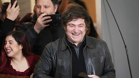 Argentina's President Javier Milei arrives to vote in city legislature elections in Buenos Aires, Argentina, Sunday, May 18, 2025.