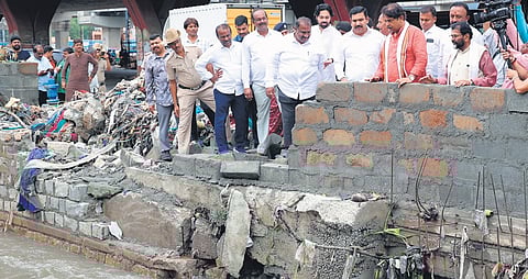 BJP leaders inspect an SWD at Silk Board on Tuesday