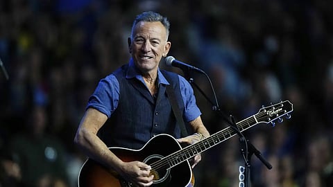 Bruce Springsteen performs at a campaign rally supporting Democratic presidential nominee Vice President Kamala Harris, Oct 28, 2024.