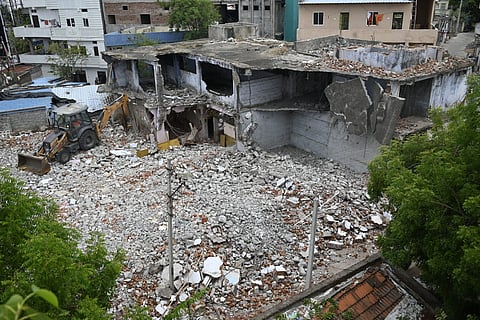 Dismantle of Tyagaraja Lalitakala Parishat old building near one town police station in Karimnagar on Wednesday.