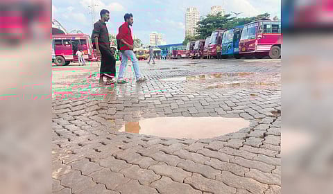 Deep potholes at Vyttila Mobility Hub carriageway