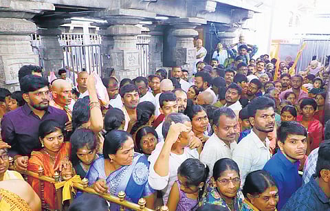 Devotees are seen thronging Sri Raja Rajeshwara Swamy temple in Vemulawada, Rajanna-Sircilla district on Friday