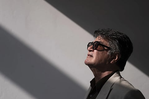 Director Jafara Panahi poses for a portrait photograph for the film "It Was Just an Accident" at the 78th International Film Festival, Cannes, southern France, Wednesday, May 21, 2025.