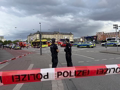 Police near the scene of a stabbing at Hamburg Central Station in Hamburg, Germany, Friday, May 23, 2025.