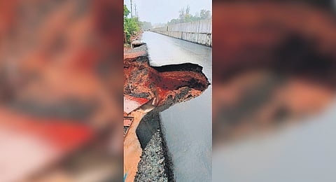 Service road along NH 66 that caved in at Chemmattamvayal near Mavungal in Kasaragod