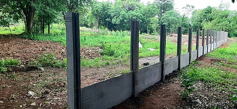 Boundary wall being constructed at the land allocated by the Palakkad municipality to the NSS Karayogam Valiyapadam within the public cremation ground at Mattumantha